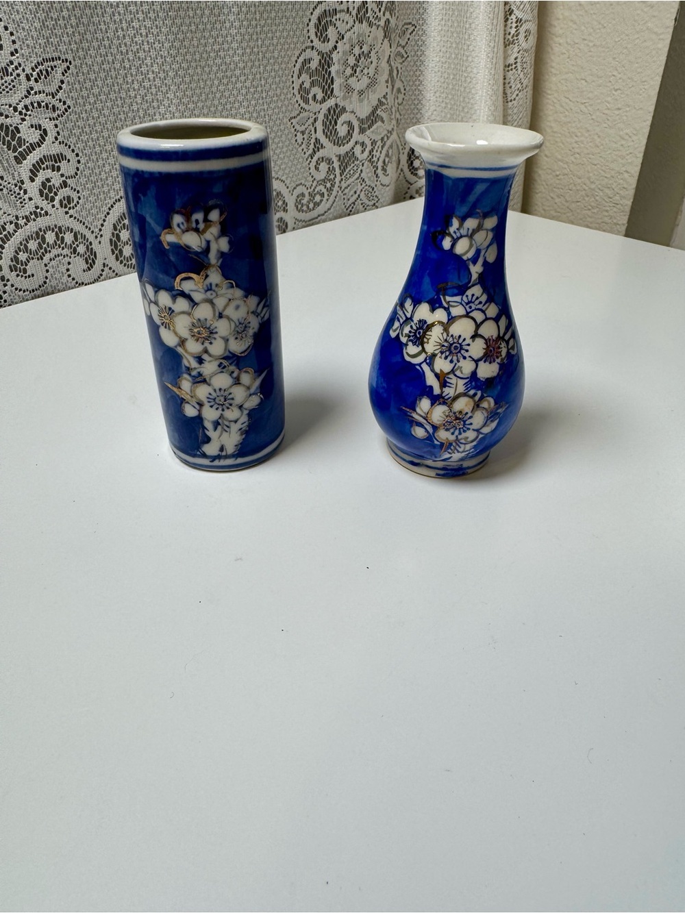 Blue Floral Ceramic Bud Vase’s. Set of two. 4 inches tall.